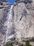 Famous rock formation with lower yosemite waterfall in the romantic valley of yosemite park