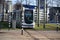 The famous roundabout with road and streetcars named Hofplein with fountain in the middle downtown Rotterdam in the Netherlands.