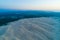 Famous sand dunes near the ocean at dawn.