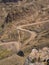 The famous Sani mountain pass dirt road with many tight curves connecting Lesotho and South Africa