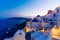 Famous Santorini blue dome churches at night, Oia, Santorini, Greece