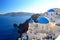 Famous Santorini blue dome churches at Oia, Santorini, Cyclades, Greece