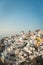 The famous Santorini windmills view with Aegean sea in the background. Sunset in Oia village. Greek destinations