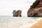 Famous sea stacks of Baia delle Zagare bay in Gargano National park. Natural rock sculptures made by Adriatic sea waves, wind and