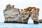 Famous sea stacks of Baia delle Zagare bay in Gargano National park. Natural rock sculptures made by Adriatic sea waves, wind and