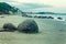 Famous spheric Moeraki Boulders at the coastline in New Zealand