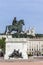 Famous Statue and Fourviere basilica on a background in Lyon cit