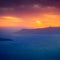 Famous sunset above Caldera view over sea in Santorini Island