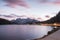 Famous tourist place Lake Lago di Misurina on sunset. picture with long e[posure and amazing dramatic sky