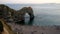 Famous tourist spot Durdle Door at sunset