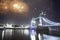 Famous Tower Bridge in the evening with fireworks, London, England