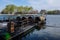 Famous travel area with Chinese traditional boats at the pier of Rear Lake in Beijing, China