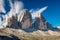 Famous Tre Cime di Lavaredo with blue sky, Dolomites Alps, Italy