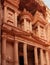 Famous Treasury of Petra. Place where there are always lot of tourists. Ancient building hollowed out in red stone