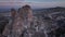 The Famous Uchhisar Cave Castle In Cappadocia, At Sunset