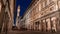 The famous Uffizi and the tower of the Palazzo Vecchio of Florence illuminated at night