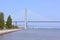 Famous Vasco da Gama Bridge and pedestrian promenade along the river in Libon, Portugal.