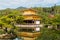 Famous view of Temple of the Golden Pavilion Kinkaku-ji with its reflection in the pond