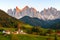 Famous village of Santa Maddalena at autumn colors in the background of the Odle mountain range, Funes valley Trentino Alto Adige