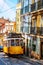 Famous vintage tram in the street of Alfama, Lisbon, Portugal