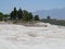 Famous white calcium travertines and pools in Pamukkale, Turkey.