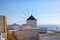 Famous windmill in Oia town, Santorini, Greece