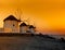 Famous windmills in Mykonos at sunset