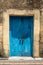 Famous Zanzibar old blue door - portrait format