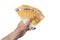 A fan of 50 fifty euros. The hand of a European man holds a fan of European money. Isolated white background.