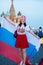 Fan of FIFA kokoshnike with Russian flag on red square in Moscow