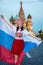 Fan of FIFA kokoshnike with Russian flag on red square in Moscow