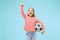 Fan sport teen player holding soccer ball isolated on blue background