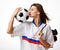 Fan sport woman player in russian uniform hold soccer ball celebrating kissing