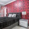 Fancy bedroom with ornament wallpaper