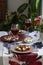 A fancy dinner for two: salad, brie cheese and white bread sandwiches