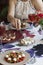 A fancy dinner for two: salad, brie cheese and white bread sandwiches