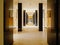 Fancy hallway of an office building, with pwalls in marble and pilars in shine black granite