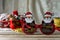 Fancy red Santa glasses on rustic background