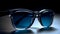 Fancy trendy modest blue color dark lens man or woman fashionable attractive sun glasses at the studio shot dark background