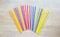 Fanned out row of colorful plastic straws