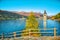 Fantasic autumn view of submerged bell tower in lake Resia