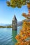 Fantasic autumn view of submerged bell tower in lake Resia