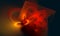 Fantastic 3d digital illustration of red hot fiery geometric ornamental structure, core or hearth blazing in deep dark space.