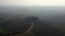 Fantastic aerial top view flight drone foggy morning Tuscany valley Italy autumn