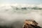 Fantastic ancient rock on cliff. Scenery tropical forest landscape. Beautiful mist and light blue sky backgrounds. Thai-Laos