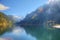 Fantastic autumn sunshine lights on mountain lake Gosausee