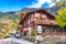 Fantastic autumn view of traditional swiss chalets in Wengen village