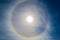 Fantastic beautiful sun halo phenomenon,or the sun with circular rainbow.