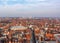 Fantastic Bruges city skyline with red tiled roofs and numerous churches` towers in sunny winter day