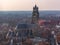 Fantastic Bruges city skyline with red tiled roofs and Saint-Salvator Cathedral tower in winter day